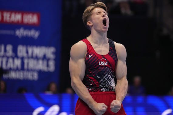 Shane Wiskus of Spring Park celebrates after competing in the floor exercise on the final day of the United States men's gymnastics Olympic trials at 