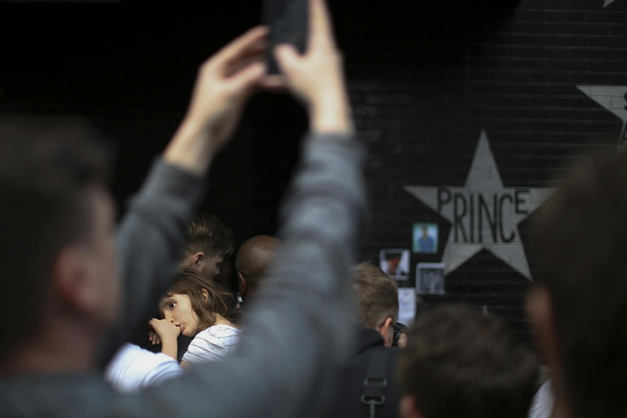 The growing memorial under Prince's star at First Ave. drew multitudes of fans throughout Tuesday afternoon and evening.