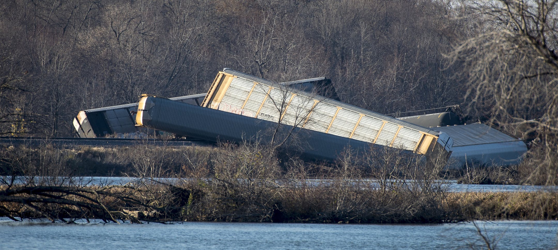Train cars were overturned outside of Alma with some cars in the Mississippi River. ] (AARON LAVINSKY/STAR TRIBUNE) aaron.lavinsky@startribune.com Dozens of train cars derailed at about 9am on Saturday, Nov. 7, a few miles outside of Alma, Wis. The cars were carrying denatured alcohol which may be leaking into the Mississippi River.