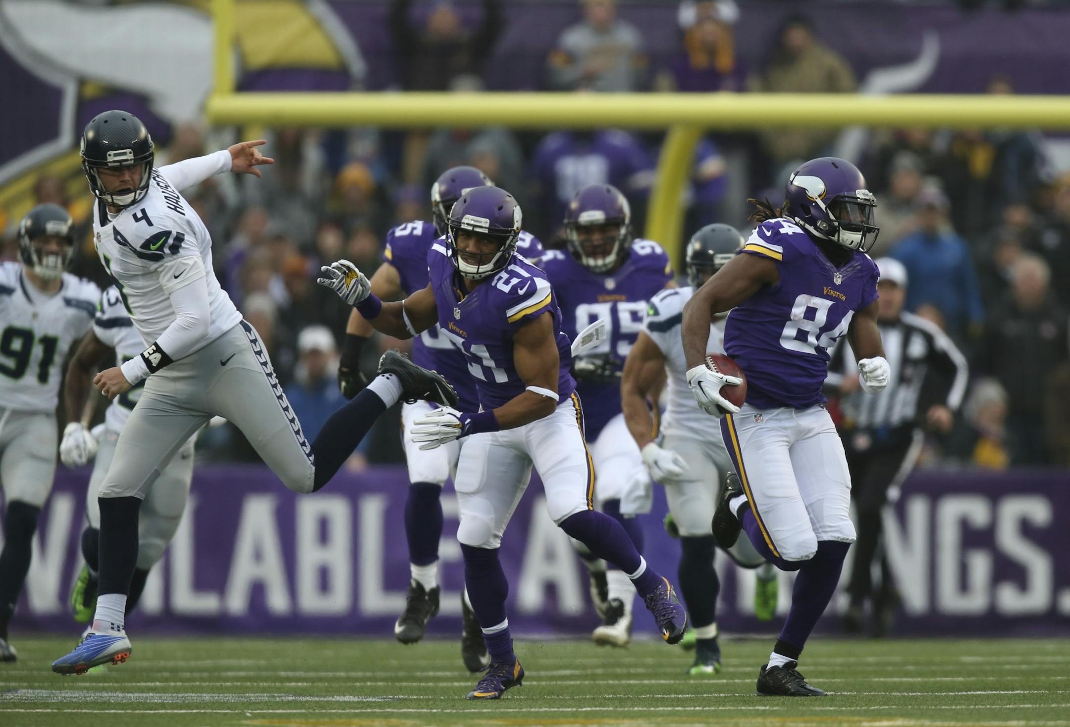 A key block by Vikings cornerback Josh Robinson (21) took out Seahawks kicker Steven Hauschka (4) and the only obstacle left in Vikings wide receiver Cordarrelle Patterson's way, as he ran a third quarter kickoff back 101 yards for the Vikings only score Sunday.