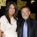 FILE - In this April 28, 2013 file photo, Robin Williams, right, and his wife Susan Schneider Williams arrive to The 2012 Comedy Awards in New York. S