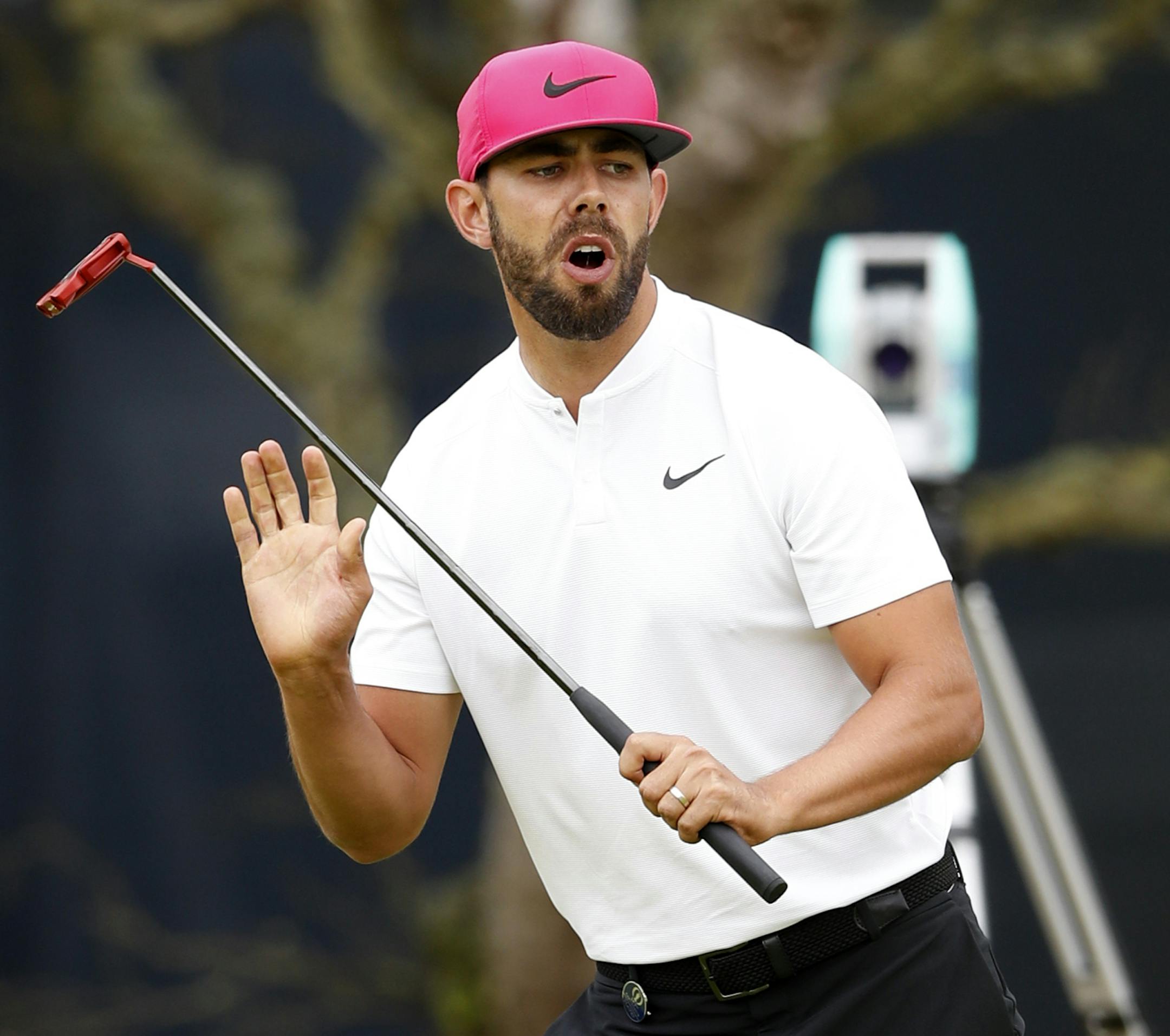 Erik Van Rooyen of South Africa reacts after his putt on the 13th green during the second round of the British Open Golf Championship in Carnoustie, Scotland, Friday July 20, 2018. (AP Photo/Alastair Grant)