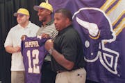 Vikings coach Dennis Green (center) poses for a picture with 1999 draft picks Jimmy Kleinsasser (left) and Daunte Culpepper.