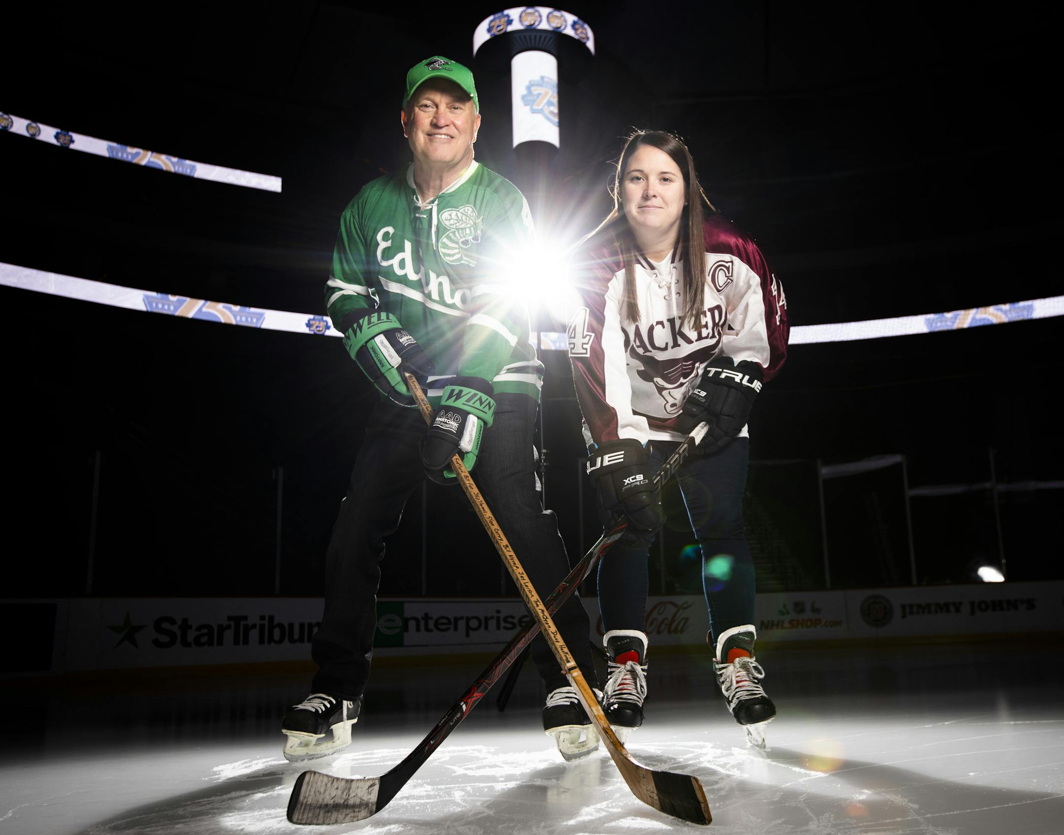 Bruce Carlson, left, and Maggie Fisher pose for a photo.