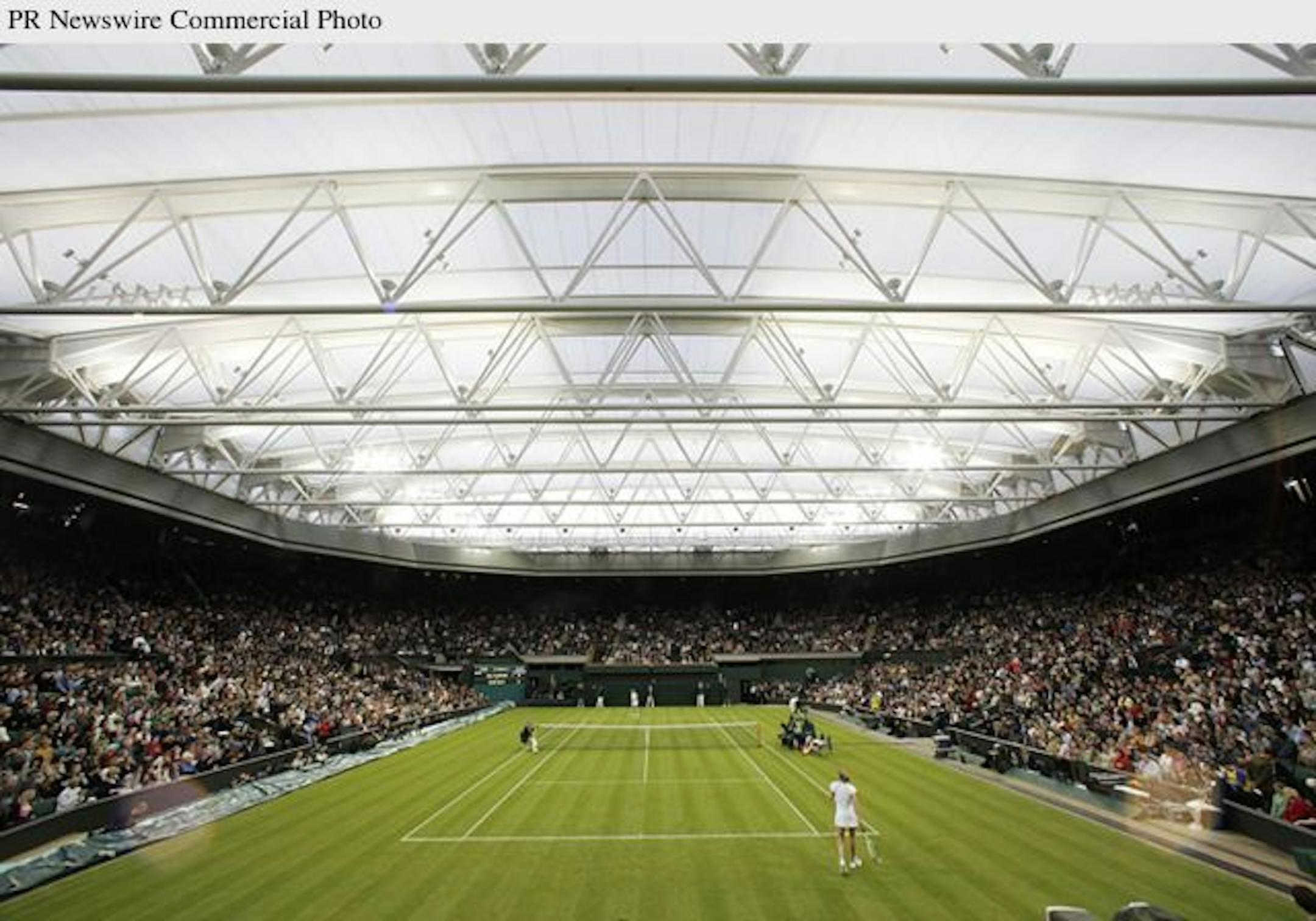 Steffi Graf and Kim Clijsters compete under the new Wimbledon roof during a special Centre Court celebration on May 17. The structure is composed of GORE(TM) TENARA(R) Architectural Fabric, a product that lets natural light through while blocking rain. Photo by Andi Schmid.