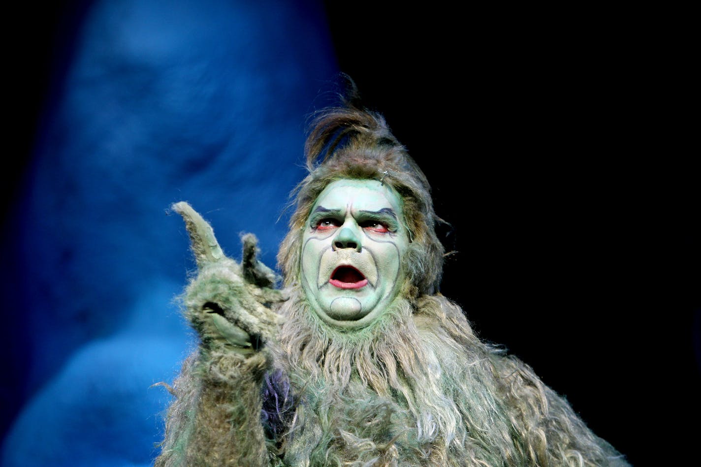 Reed Sigmund plays The Grinch in "Dr. Seuss' How The Grinch Stole Christmas" at The Children's Theatre Company in Minneapolis November 4, 2012. (Courtney Perry/Special to the Star Tribune)