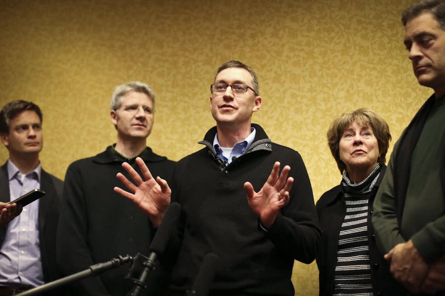 Clarinetist Tim Zavadil spoke about the contract agreement with the Minnesota Orchestra board. He was flanked by fellow musicians Kevin Watkins, Doug Wright, Marcia Peck and Tony Ross.