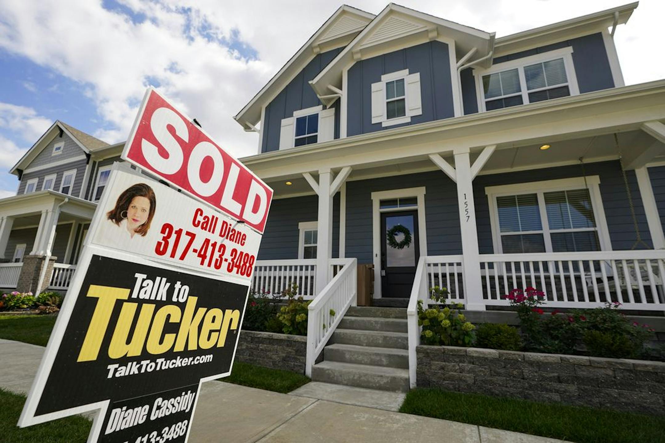 A "sold" sign is posted on a home in Westfield, Ind., Friday, Sept. 25, 2020. The housing market has staged a furious comeback this summer, even as the economy struggles to regain its footing. Home sales have surged to the highest level in more than a decade. The strength has been driven by ultra-low mortgage rates, fierce competition for a dearth of properties on the market and a wave of millennials and others vying to become homeowners.
