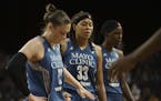 Minnesota Lynx guards Lindsay Whalen (13), Seimone Augustus (33) and center Sylvia Fowles (34) went to bench for a time out trailing the Sparks by a w