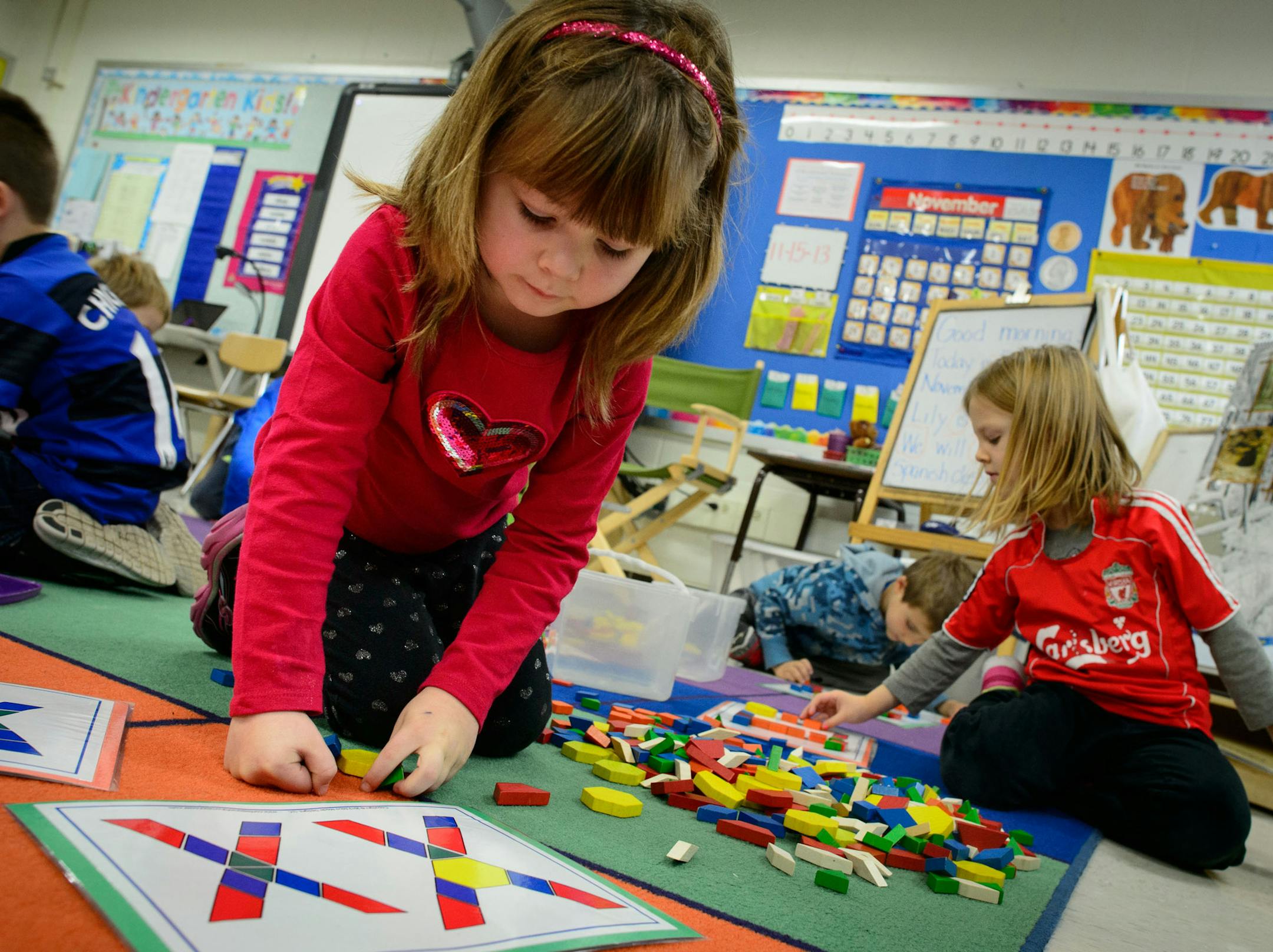 Nov. 15, 2013: Emma Rogich and Etta Hillman did alphabet puzzles in Kristin Koloski's all-day Kindergarten class at Meadowbrook Elementary in Golden Valley.