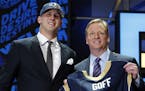 California&#x2019;s Jared Goff poses for photos with NFL commissioner Roger Goodell after being selected by the Los Angeles Rams as the first pick in 