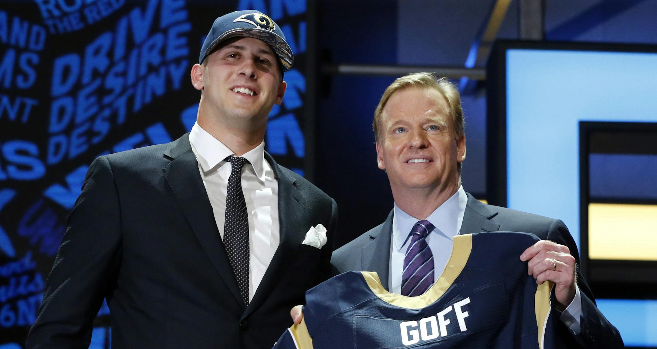 California’s Jared Goff poses for photos with NFL commissioner Roger Goodell after being selected by the Los Angeles Rams as the first pick in the first round of the 2016 NFL football draft, Thursday, April 28, 2016, in Chicago. (AP Photo/Charles Rex Arbogast)
