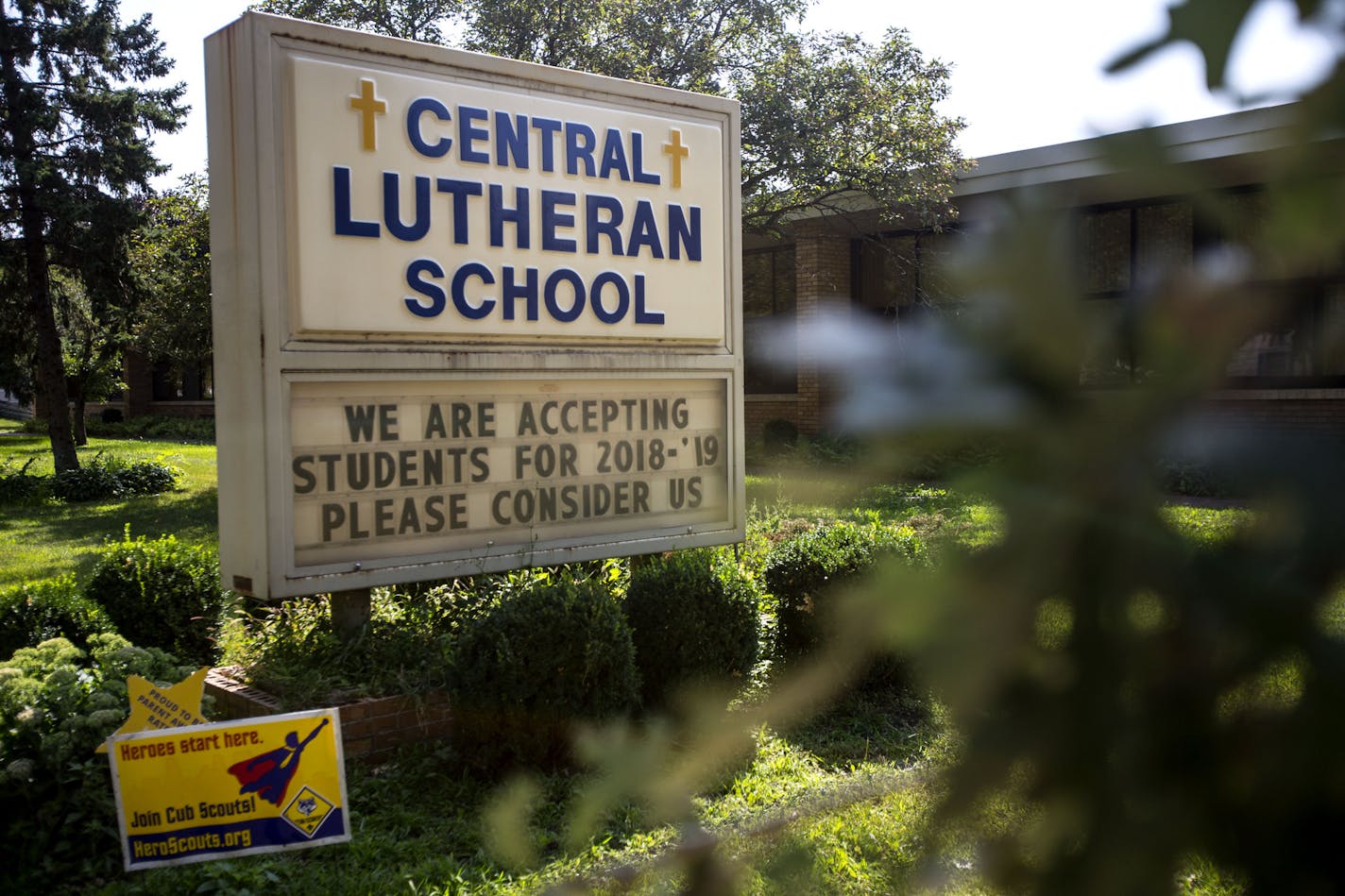 Central Lutheran School's sign still says that the school is accepting applications for the upcoming school year, despite being informed they will shut down before the school year begins.