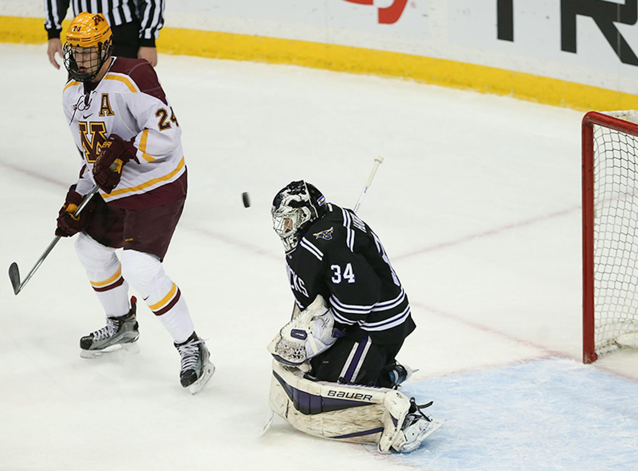 A pwerplay shot by Gophers forward Justin Kloos that tied the game 1-1 sailed over the right shoulder of Mavericks goalie Cole Huggins in the first period Sunday afternoon.