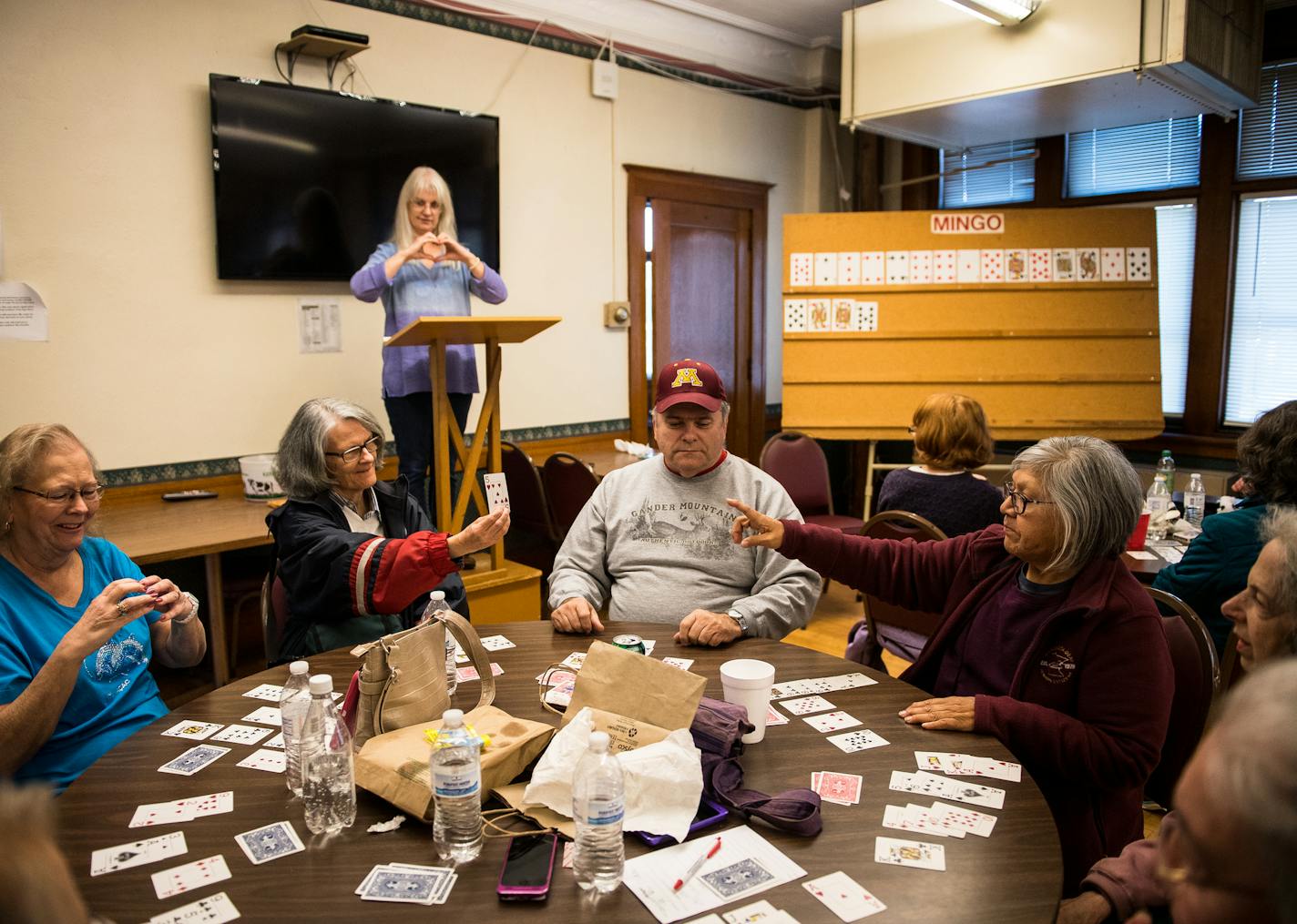 Mingo players confirmed with each other at at five of hearts was called while they played Saturday afternoon at Thompson Hall. ] (AARON LAVINSKY/STAR TRIBUNE) aaron.lavinsky@startribune.com For 100 years, Thompson Hall in St. Paul has been thee social epicenter for Minnesota's deaf community. We step into these hallowed halls of Minnesota's deaf club on a Saturday night to find out if it's still the hot hangout for playing Mingo (Bingo), drinking a beer, and signing with friends. Photographed Sa