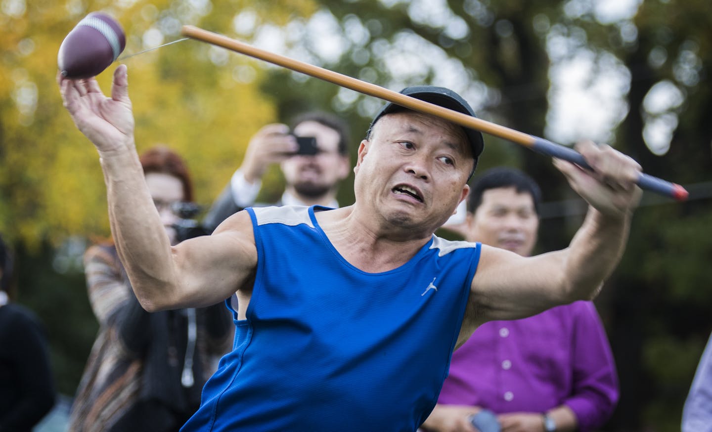 Young Vang demonstrates the game of Tuj Lub. ] (Leila Navidi/Star Tribune) leila.navidi@startribune.com BACKGROUND INFORMATION: St. Paul opens the state's first Tuj Lub courts at the Duluth-Case Recreation Center in St. Paul on Tuesday, October 4, 2016. Tuj Lub is a game popular with the city's large Hmong population and St. Paul's move signals a continuing shift to better meet the demands of a changing city demographic.