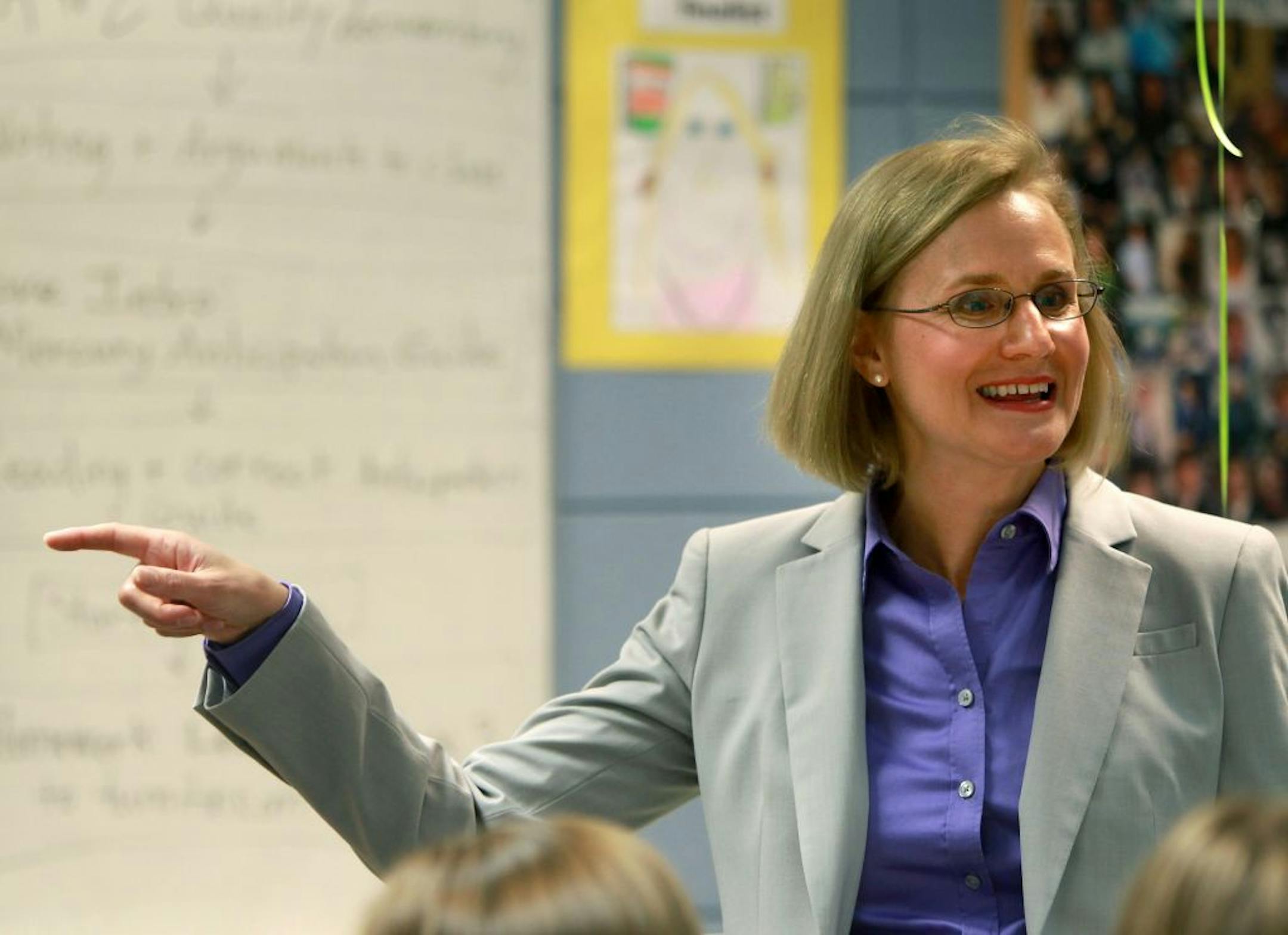 Edina High School teacher Jackie Roehl led her English class in a debate regarding documentaries, Wednesday, May 30, 2012. Roehl, an Edina English teacher, was recently named teacher of the year. Roehl is known for instituting culturally sensitive curriculum at Edina.(ELIZABETH FLORES/STAR TRIBUNE) ELIZABETH FLORES � eflores@startribune.com