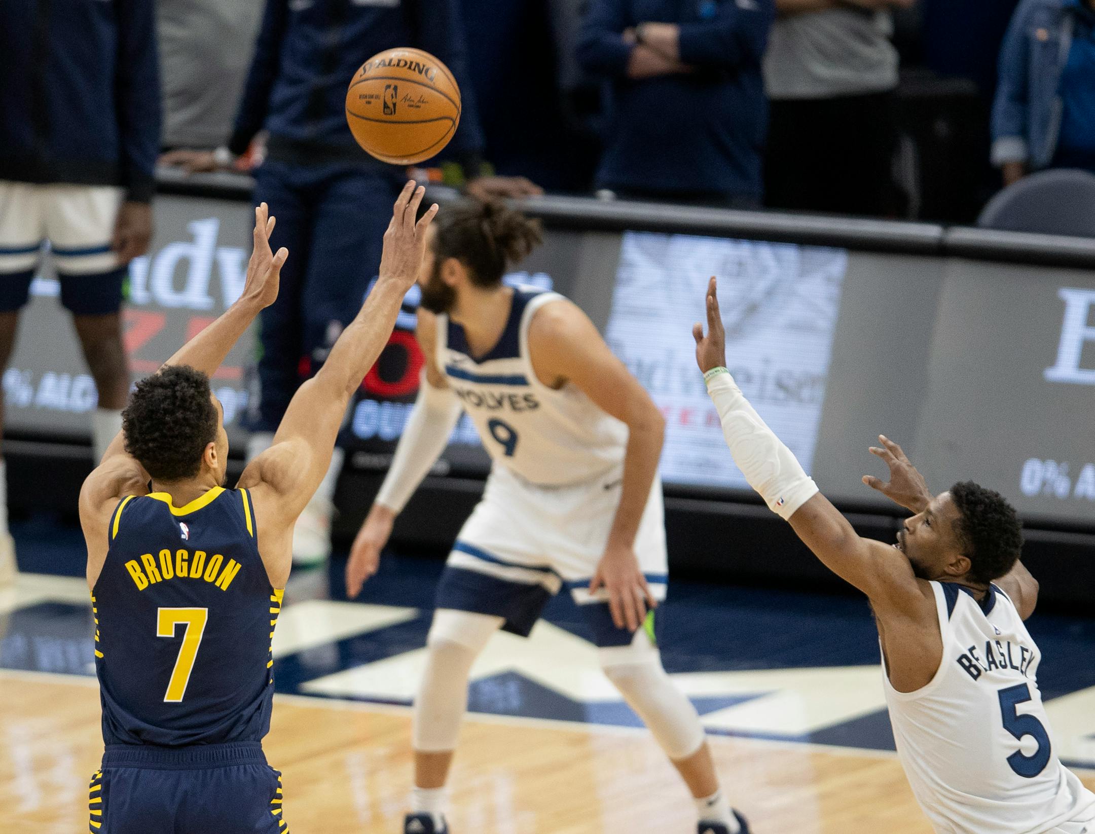 Malcolm Brogdon (7) of the Indiana Pacers made a three pointer while defended by Minnesota Timberwolves Malik Beasley (5) late in overtime.