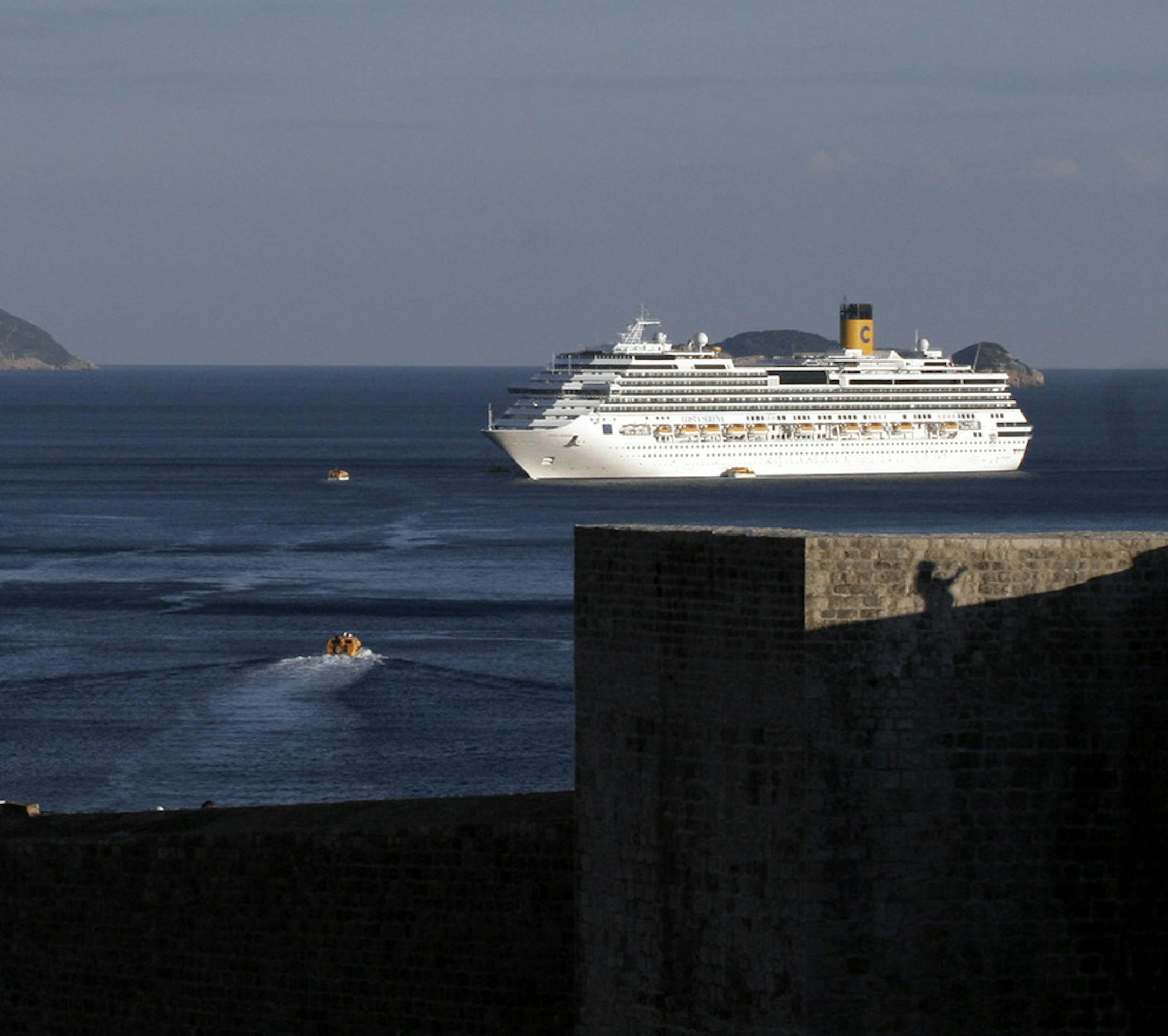 A cruise ship anchors off Dubrovnik, the main travel destination on the Croatian Dalmatian Coast; known as the Pearl of the Adriatic, Dubrovnik boasts exquisite physical perfection. Illustrates TRAVEL-DUBROVNIK (category t), by David OíDwyer, special to The Washington Post. Moved Tuesday, June 3, 2014. (MUST CREDIT: Bloomberg News photo by Greg Marinovich.)