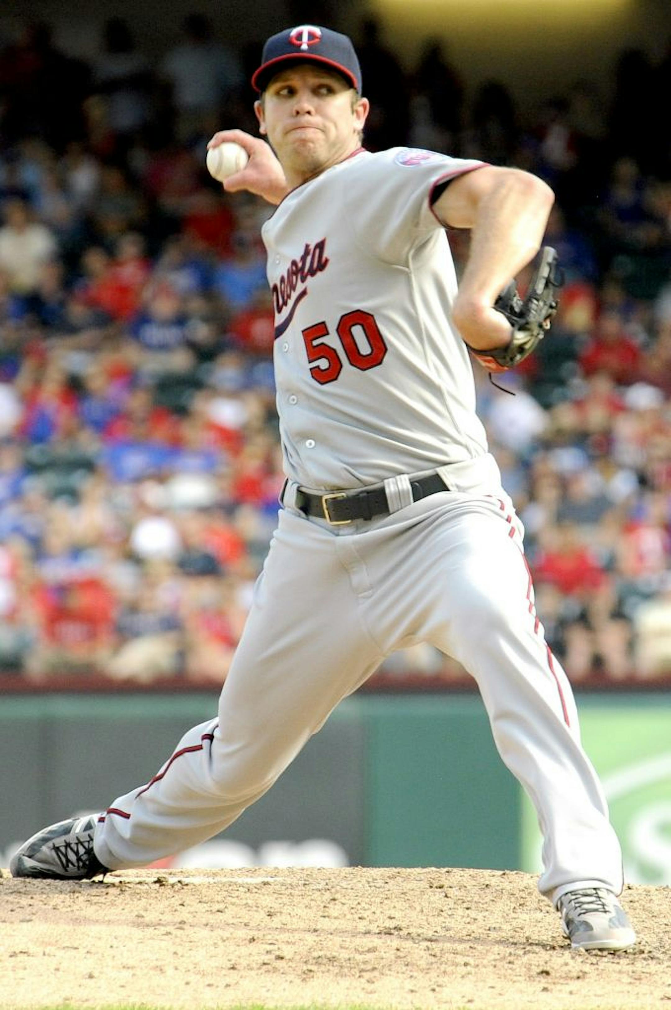 Minnesota Twins relief pitcher Casey Fien during a baseball game against the Texas Rangers, Saturday, Aug. 25, 2012, in Arlington, Texas.