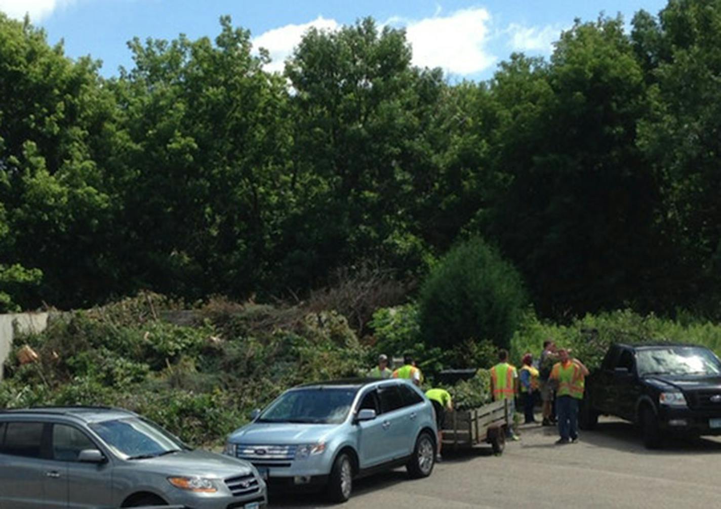 Traffic surrounds Carver County's yard waste drop-off site in Chaska. The county is going to relocate the drop-off to a parcel of land beside the Arboretum.