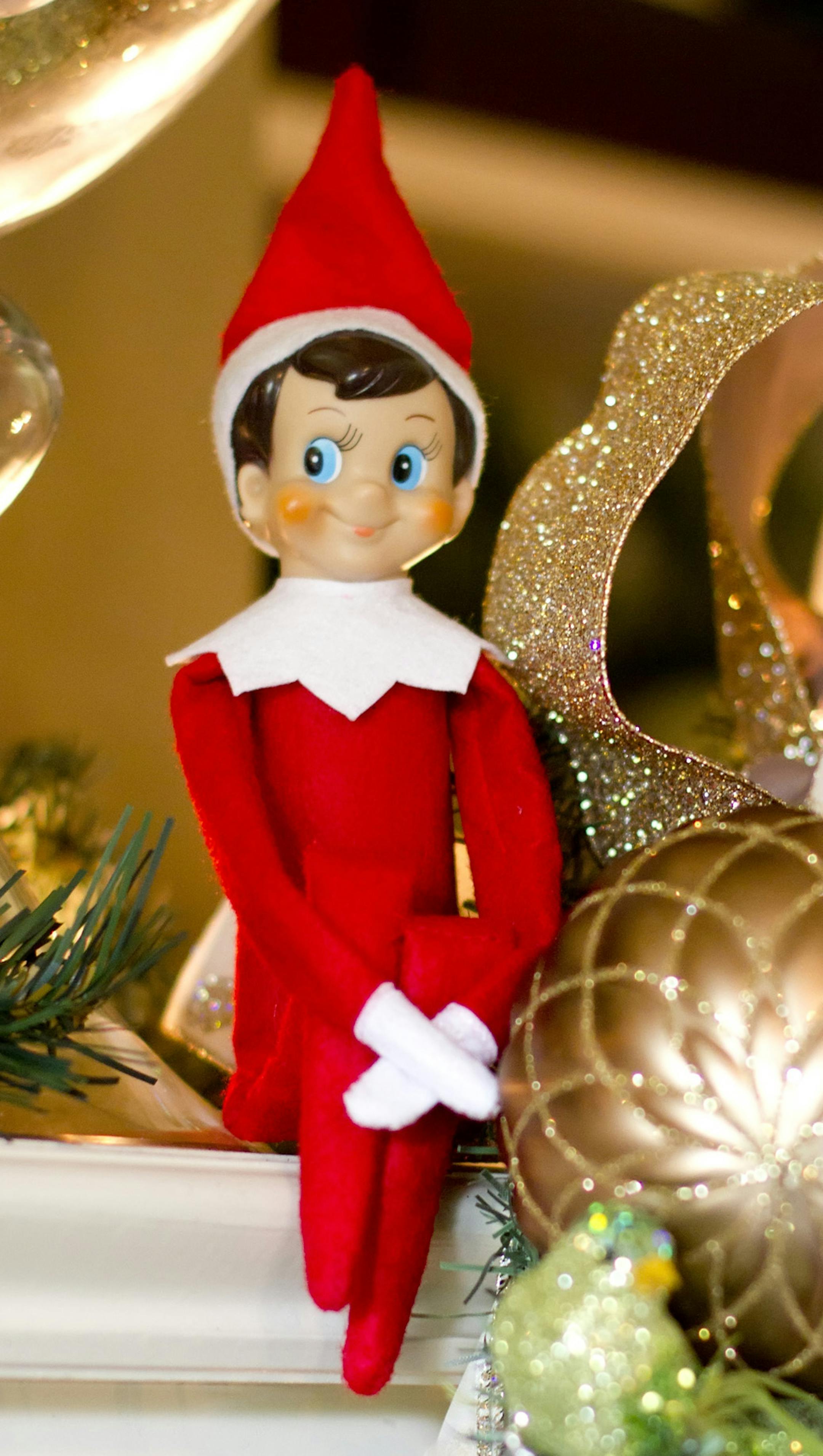 This photo provided by CCB&A, LLC, shows the Elf sitting on the Shelf. There is one hot item this holiday season that won't be resting under the Christmas tree. It will be on a shelf _ watching you. (AP Photo/CCA&B, LLC) ORG XMIT: MIN2014121812313737
