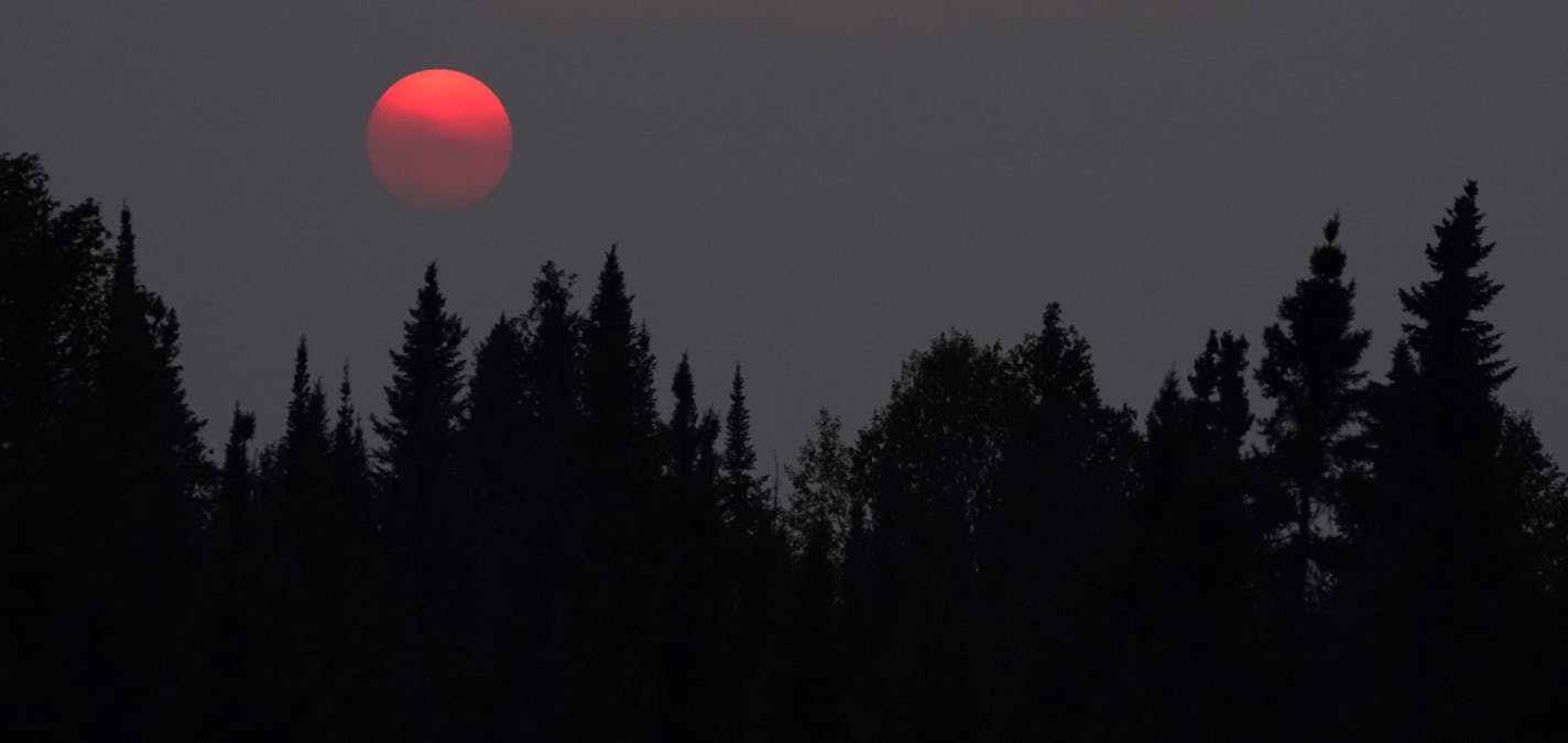 Wildfire smoke from Canada's Quetico Provincial Park caused a haze in the air as the sun set over Seagull Lake in The Boundary Waters Canoe Area Wilderness. ] ANTHONY SOUFFLE • anthony.souffle@startribune.com