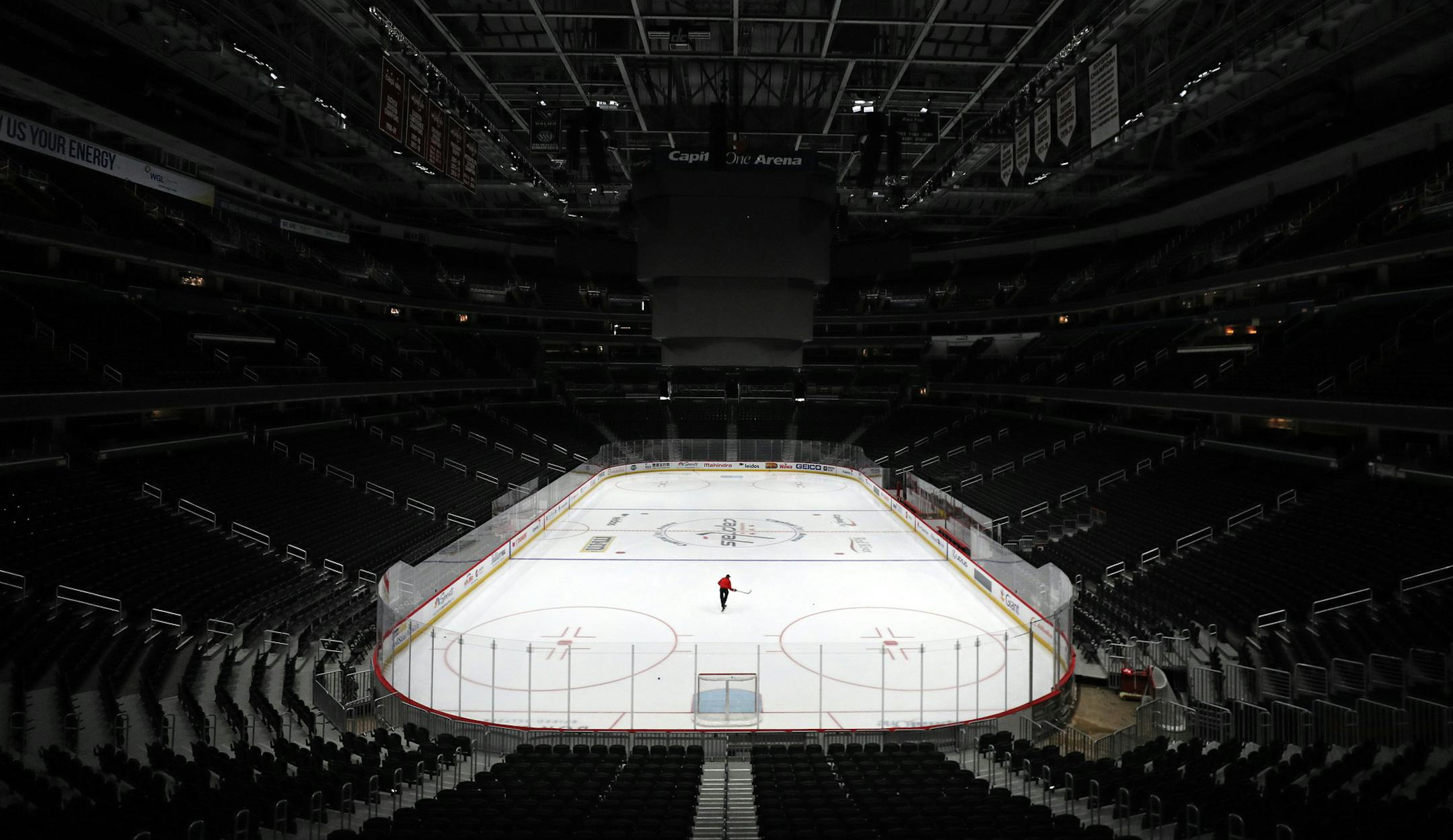 Sam Hess, Operations with Monumental Sports & Entertainment, skates alone prior Detroit Red Wings playing against the Washington Capitals at Capital One Arena on March 12, 2020 in Washington, D.C. Today the NHL announced is has suspended their season due to the uncertainty of the coronavirus (COVID-19) with hopes of returning. The NHL currently joins the NBA, MLS, as well as other sporting events and leagues around the world suspending play because of the coronavirus outbreak. (Patrick Smith/Get