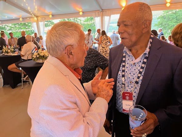 Tony Oliva shared a moment with one of his minor-league mentors, 91-year-old Jack McKeon, during a reception at the Fenimore Art Museum in Cooperstown