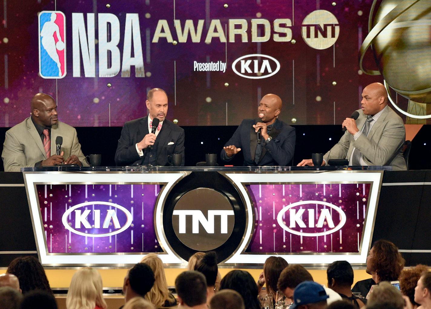 Shaquille O'Neal, from left, Ernie Johnson, Kenny Smith and Charles Barkley speak at the NBA Awards on Monday, June 25, 2018, at the Barker Hangar in Santa Monica, Calif. (Photo by Chris Pizzello/Invision/AP)