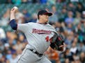Minnesota Twins starting pitcher Kyle Gibson throws against the Seattle Mariners during the first inning of a baseball game, Thursday, June 8, 2017, i