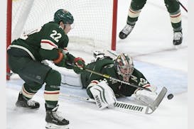 Goalie Alex Stalock got some help clearing the crease from Wild denfenseman Kevin Fiala in a 3-2 victory over the Avalanche on Thursday.