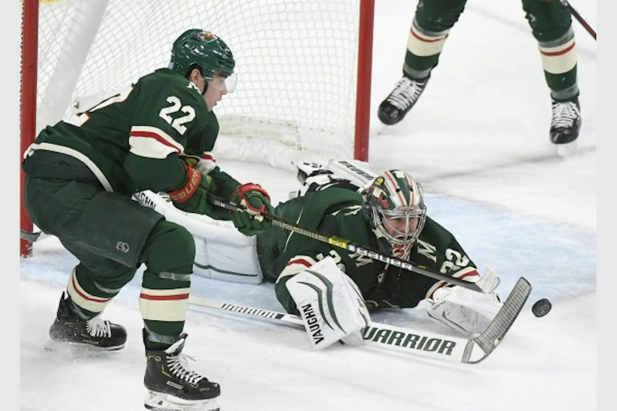 Goalie Alex Stalock got some help clearing the crease from Wild denfenseman Kevin Fiala in a 3-2 victory over the Avalanche on Thursday.
