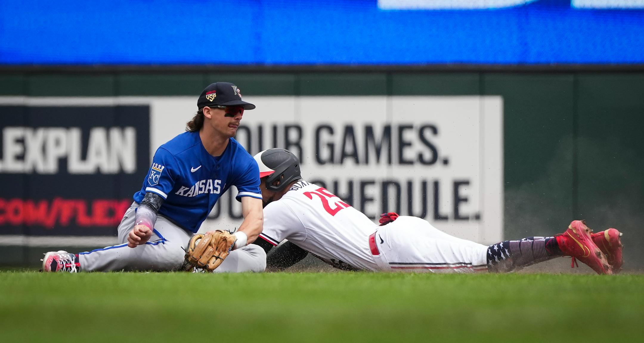 Minnesota Twins designated hitter Byron Buxton (25) steals second against Kansas City Royals second baseman Michael Massey (19) in the seventh inning.