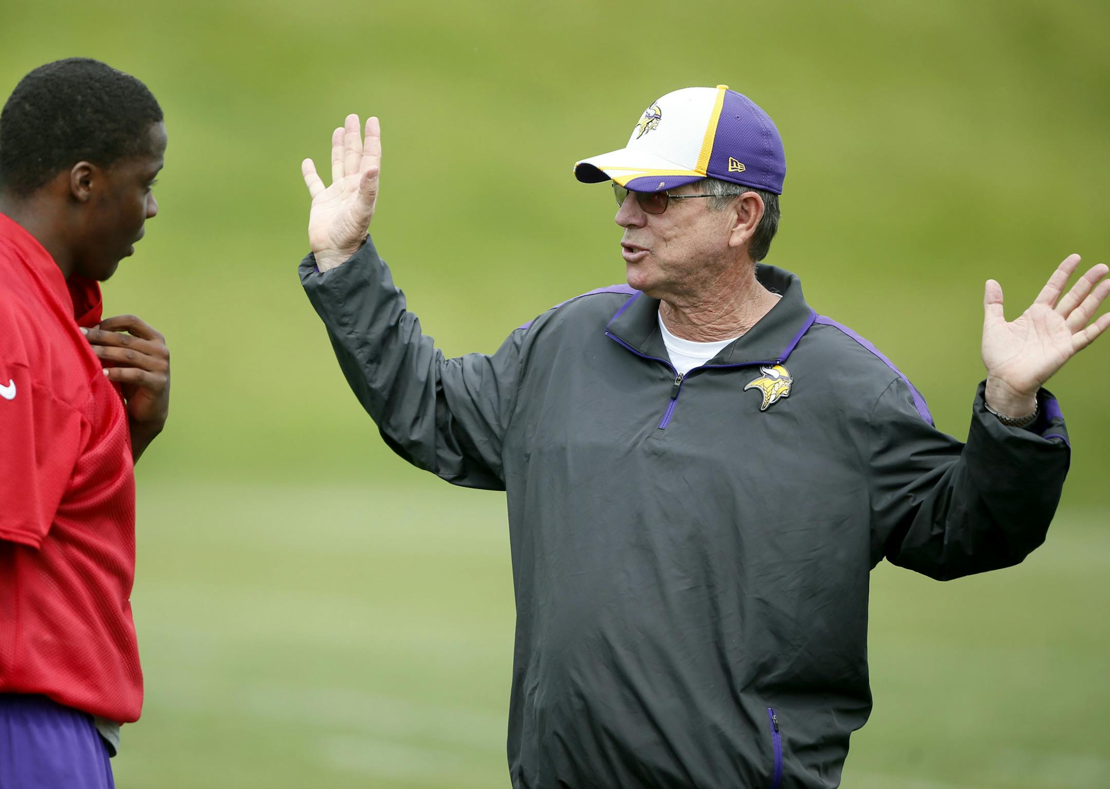Vikings offensive coordinator Norv Turner talked with rookie quarter back Teddy Bridgewater during OTA practice at Winter Park.