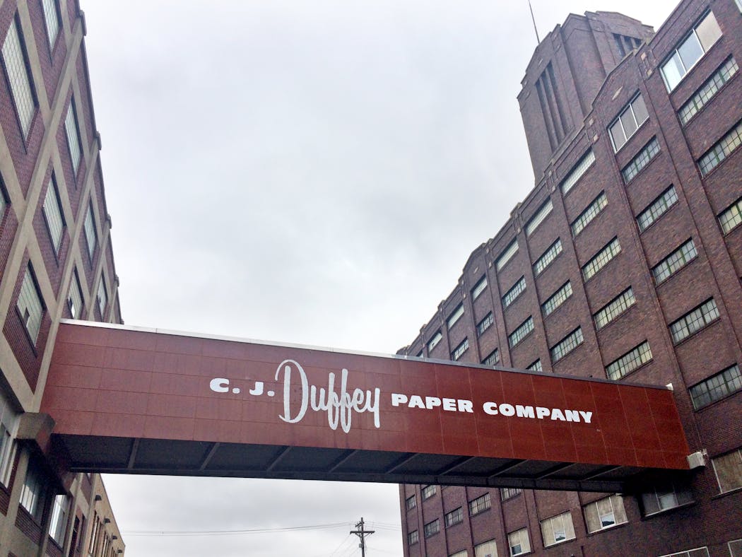 The former warehouses of the C.J. Duffey Paper Co., connected over 3rd Street N. by a skyway, will be renovated as part of the next big project by CedarSt Cos., a Chicago-based developer.