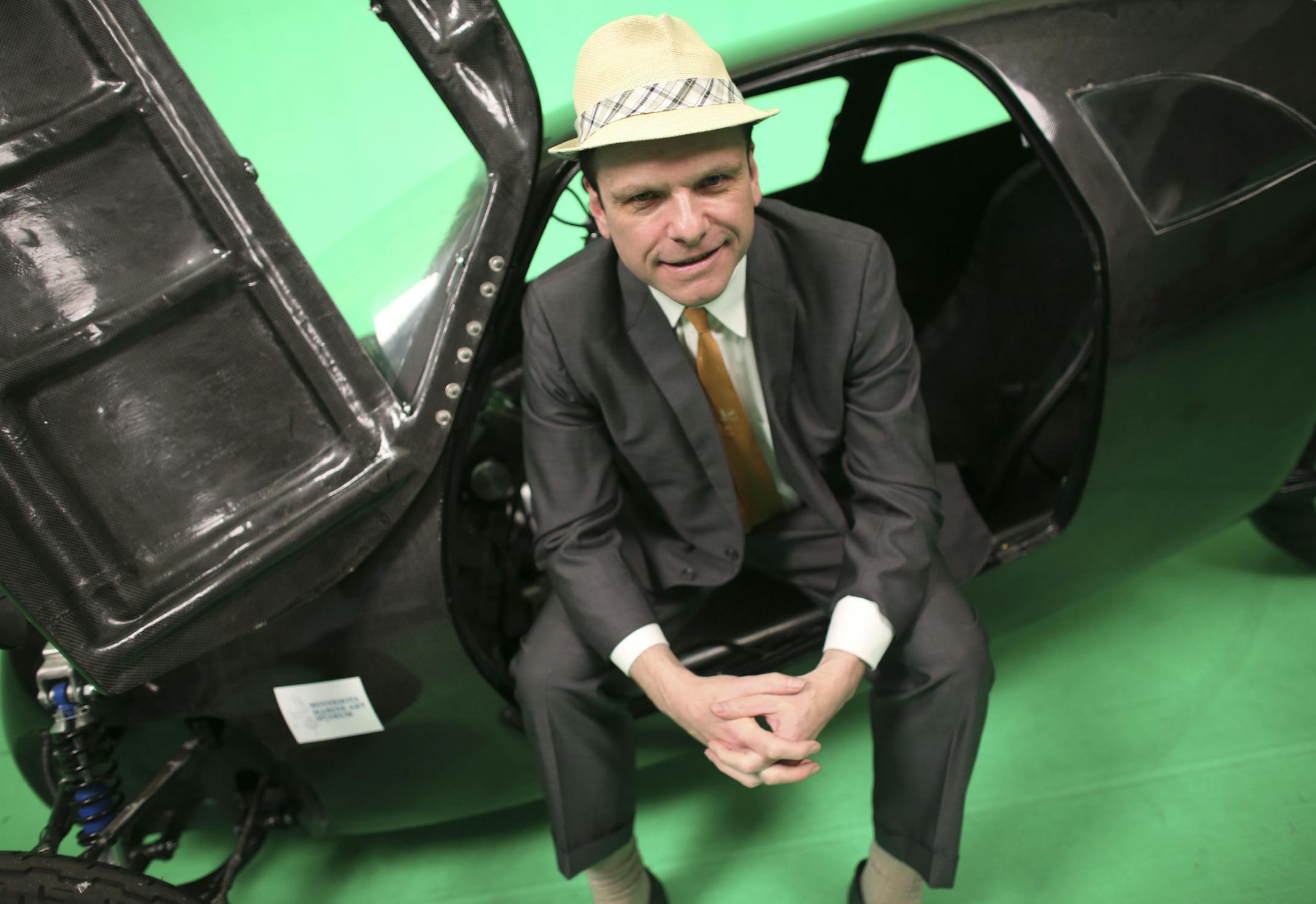 Rich Kronfeld, of Golden Valley, sat in the Rahtmobile, an abbreviation of Recumbent Automotive Human Transport, that electric-powered, enclosed tricycle whose batteries can be recharged by pedaling at a television studio in St. Paul, Min., Tuesday, June 11, 2013. Kronfeld, the main developer, said that the Rahtmobile goes at least 45 miles per hour, and seems like a cross between a motorcycle and a car ] (KYNDELL HARKNESS/STAR TRIBUNE) kyndell.harkness@startribune.com