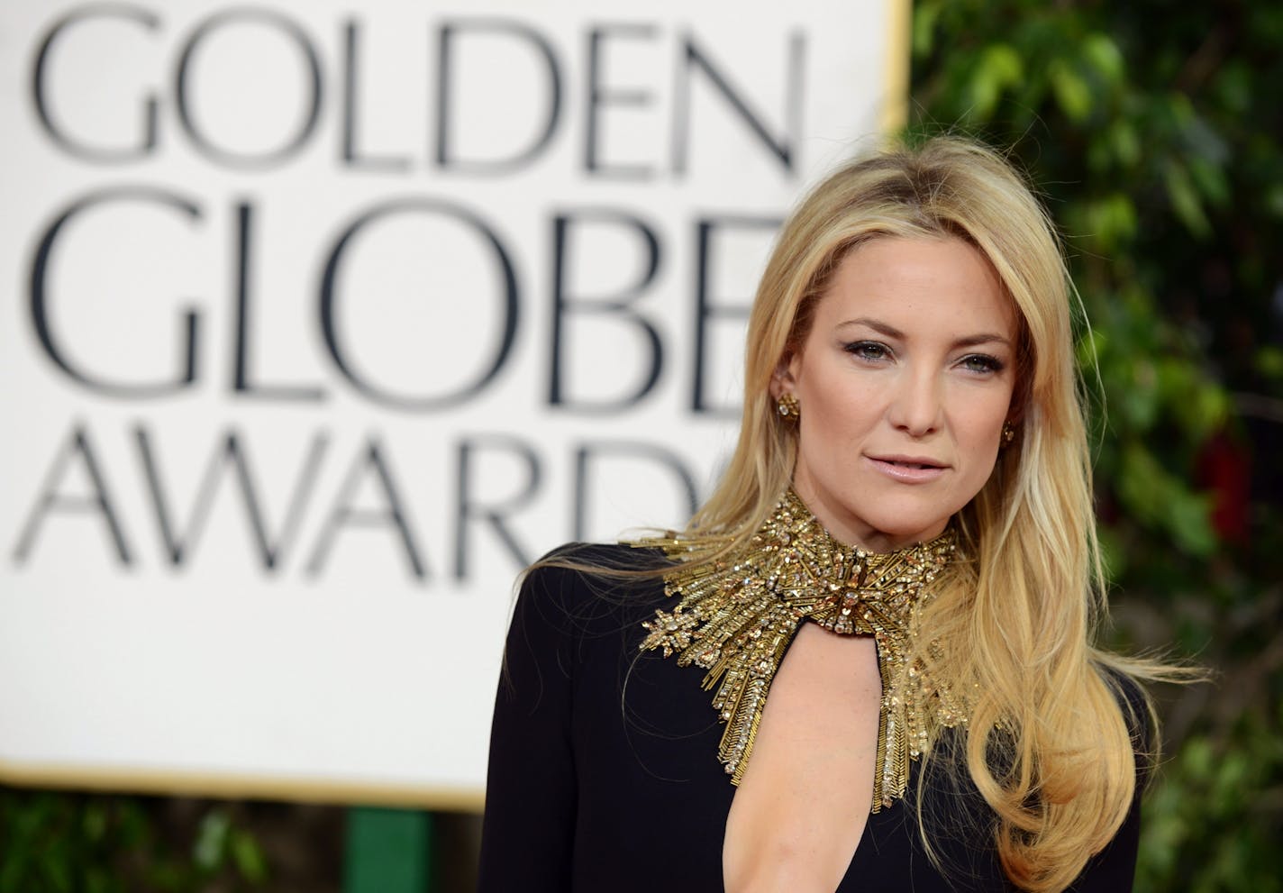 Actress Kate Hudson arrives at the 70th Annual Golden Globe Awards at the Beverly Hilton Hotel on Sunday Jan. 13, 2013, in Beverly Hills, Calif.