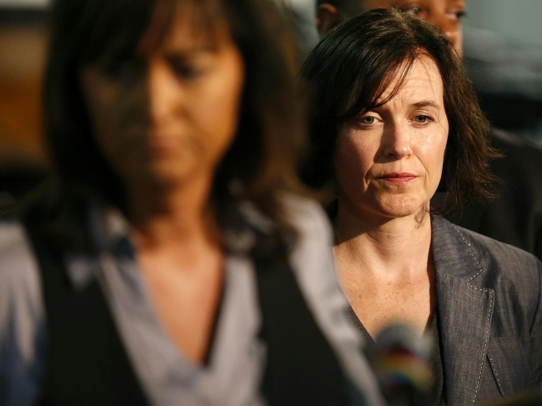 Minneapolis Mayor Betsy Hodges listened as Minneapolis Police Chief Janee Harteau finished addressing the media during a press conference at the Shiloh temple on Sunday afternoon. ] CARLOS GONZALEZ cgonzalez@startribune.com - July 27, 2014 , Minneapolis, Minn., Shiloh Temple, Al Flowers, a Minneapolis activist who spoke out last week against increasing violence in north Minneapolis, was arrested after an altercation with police officers at his home early Saturday.