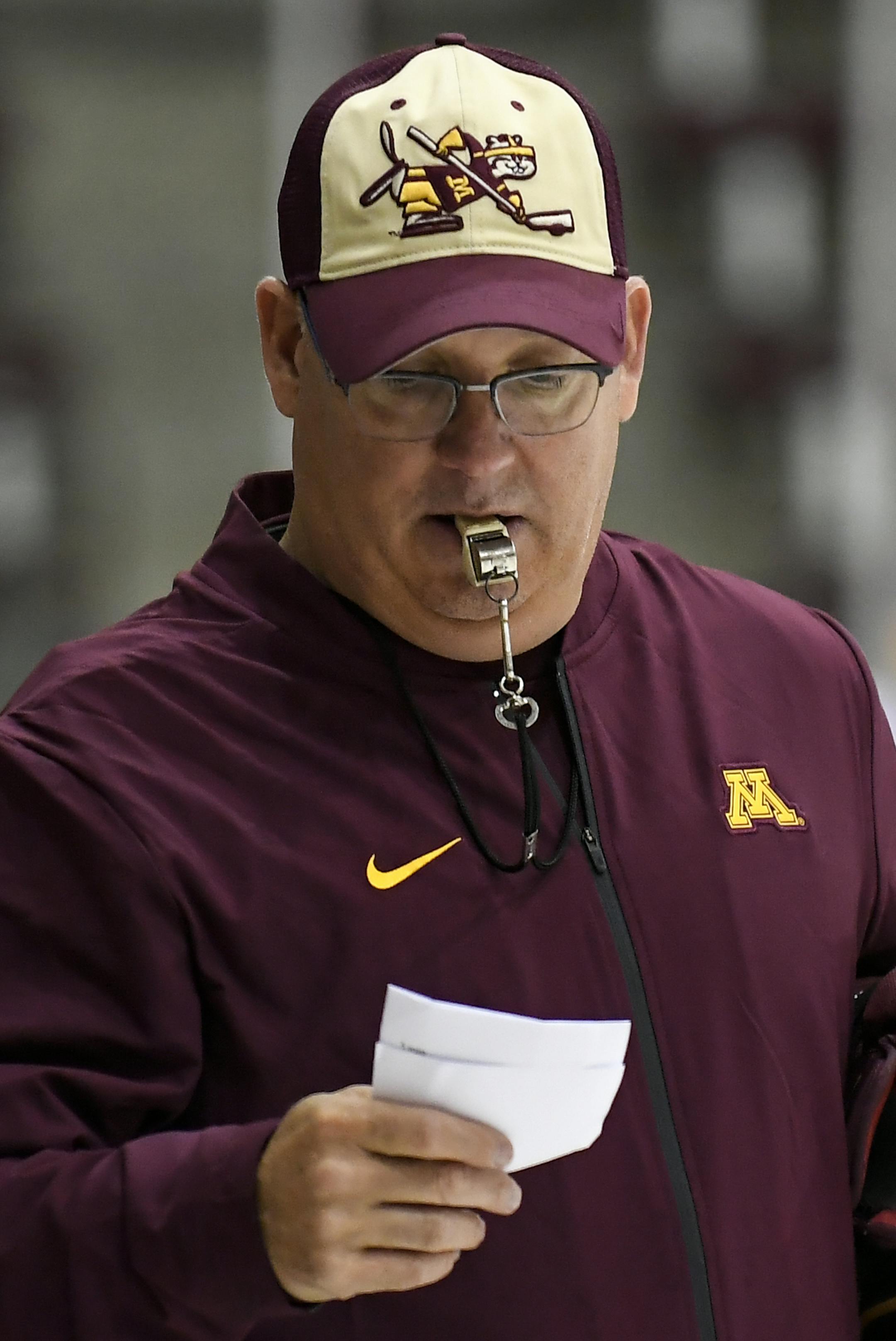 Gophers men's hockey coach Bob Motzko looked through notes during Tuesday's practice at Ridder Arena. ] AARON LAVINSKY &#xa5; aaron.lavinsky@startribune.com Profile on Bob Motzko, the Gophers new men's hockey coach who moved an hour and a half down the highway from St. Cloud. We photograph practice on Tuesday, Sept. 25, 2018 at Ridder Arena in Minneapolis, Minn.