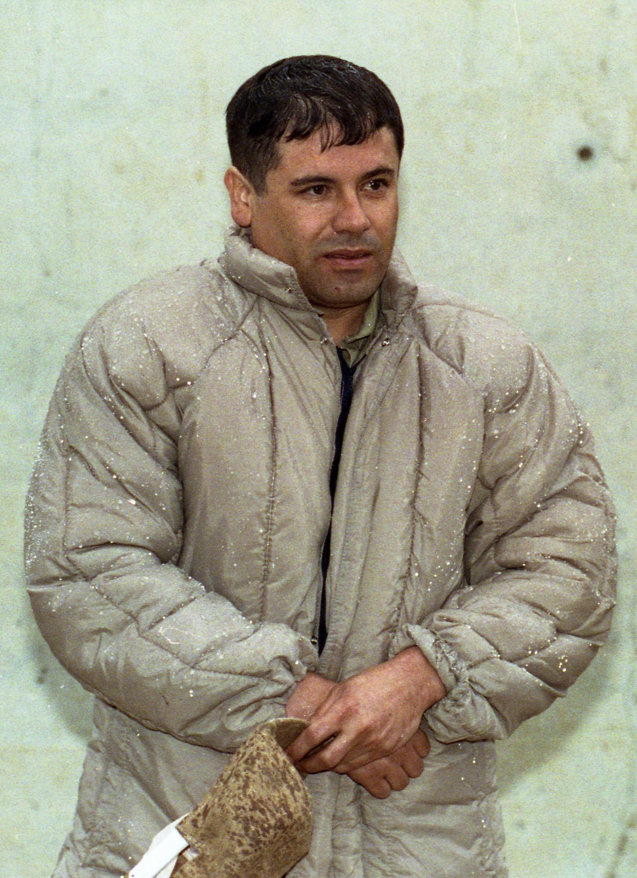 FILE - In this June 10, 1993 file photo, Mexican drug lord Joaquin "El Chapo" Guzman is shown to the press at the Almoloya de Juarez, a high security prison on the outskirts of Mexico City. A senior U.S. law enforcement official said Saturday, Feb. 22, 2014 that Guzman, the head of Mexicoís Sinaloa Cartel, was captured alive overnight in the beach resort town of Mazatlan. Guzman faces multiple federal drug trafficking indictments in the U.S. and is on the Drug Enforcement Administration