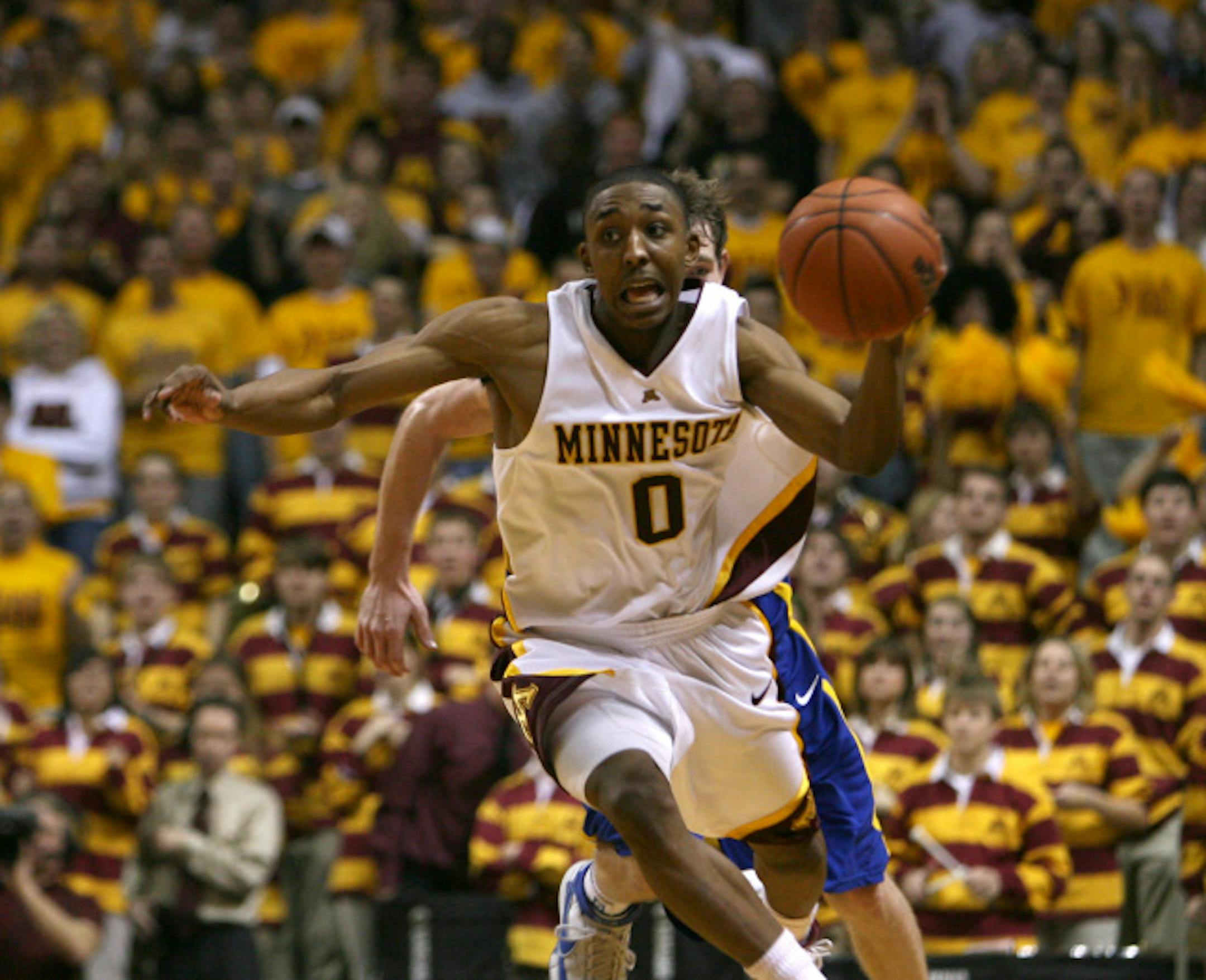 Minnesota's Al Nolen headed upcourt after he stole the ball away from South Dakota's Garrett Callahan in the second half.