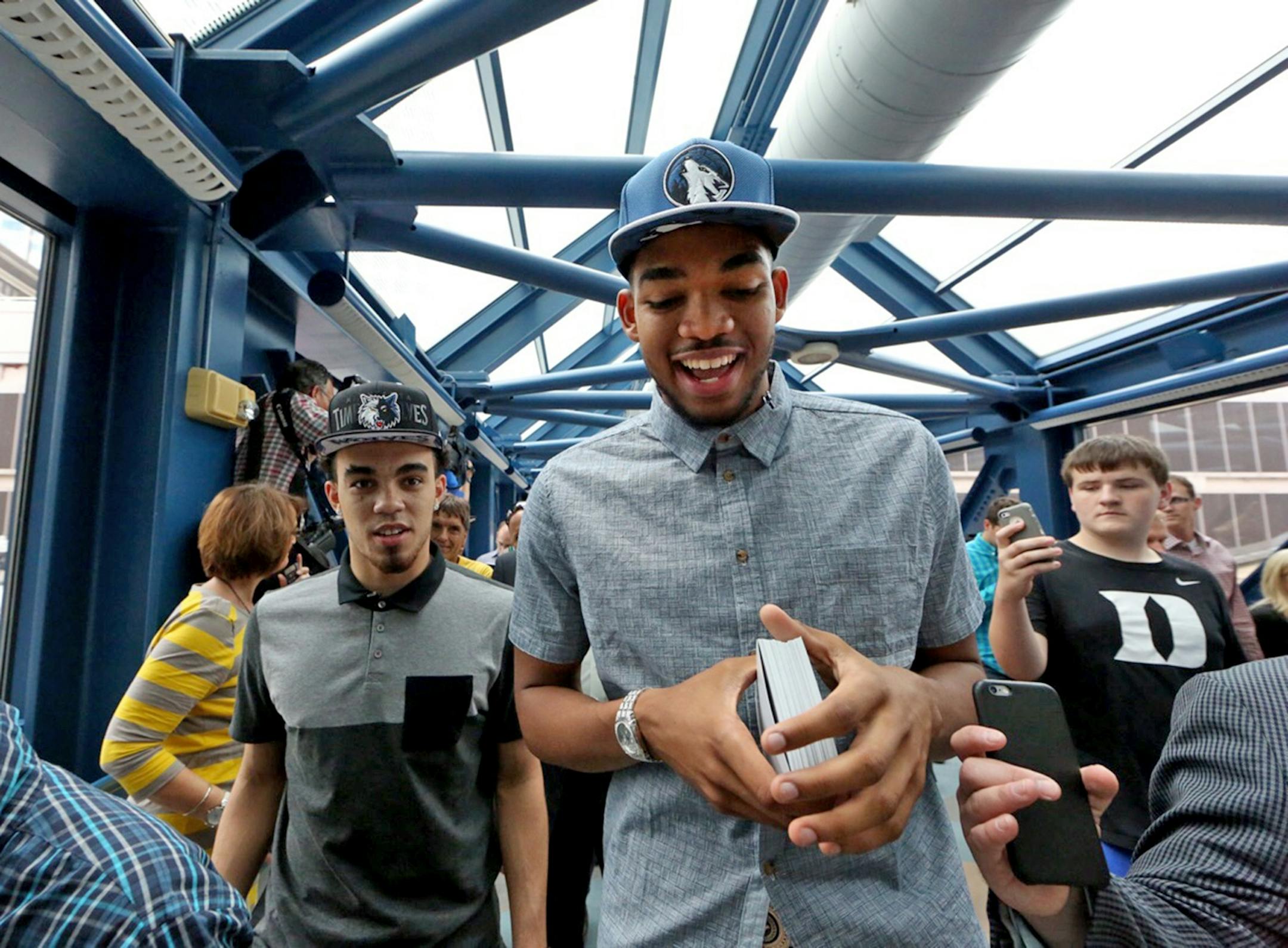 Timberwolves draft picks, Tyus Jones (left) and Karl-Anthony Towns (center / right) tour the downtown Minneapolis skyways, Friday, June 26, 2015.