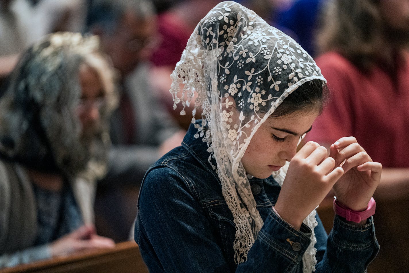 In South St. Paul, Minnesota on September 6, 2021, at St. Augustine Church, Noreen Dvorak,11, wears a head veil during service. ] Pope Francis has said the growing expansion of the Latin Mass is being "exploited to widen the gaps'' among Catholics and "expose her to the peril of division." The Pope announced in July that he would limit these Masses, which have become a mecca for conservative Catholics. RICHARD TSONG-TAATARII • richard.tsong-taatarii@startribune.com