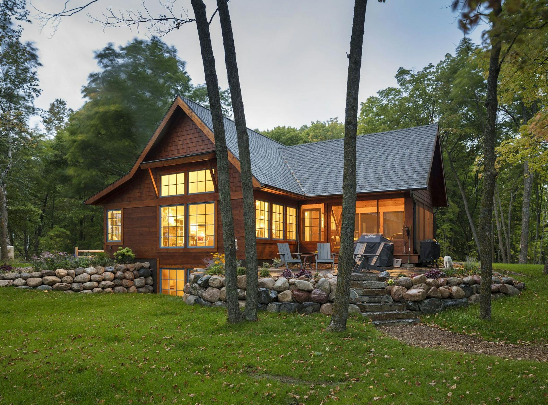 Charlie and Jennifer Lick built their cabin, designed by Kell Architects, on the point of a peninsula on Clearwater Lake.