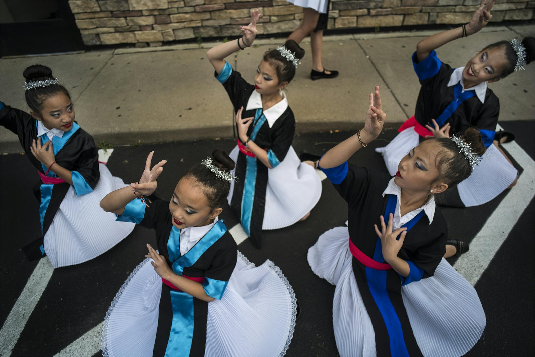 Members of a dance troop from the Community School of Excellence in St. Paul practiced before performing updated Hmong folkloric dances to celebrate Little Mekong Plaza's dedication.] Little Mekong Plaza is dedicated on Wednesday, Sept. 28, as a community open space that will be central to the annual Little Mekong Night Market and the Hmong community in St. Paul. It's a small space, expected to have a big impact.Richard Tsong-Taatarii/rtsong-taatarii@startribune.com