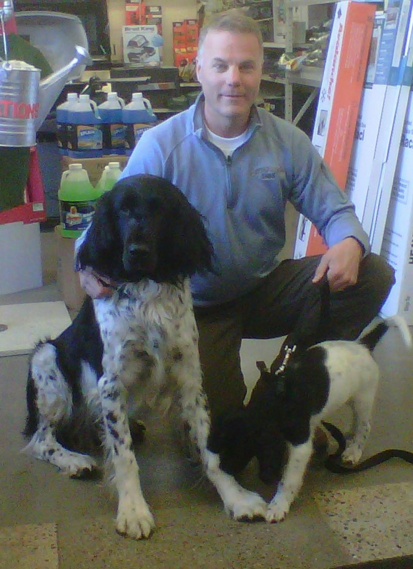 Store owner Mark Settergren with Jager and Jurgen.