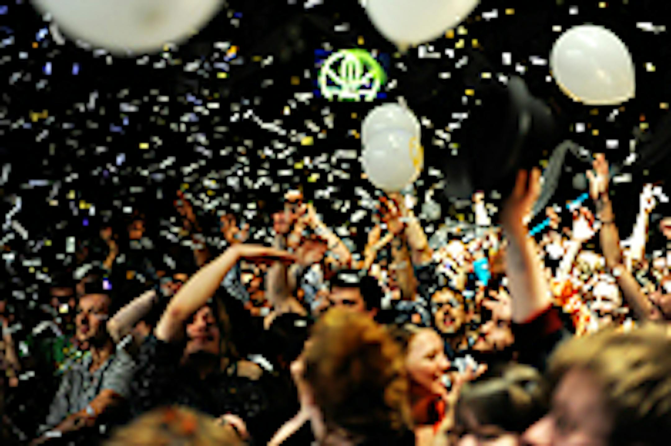 Balloons and confetti drop from the ceiling at Gayngs' "Last Prom on Earth."