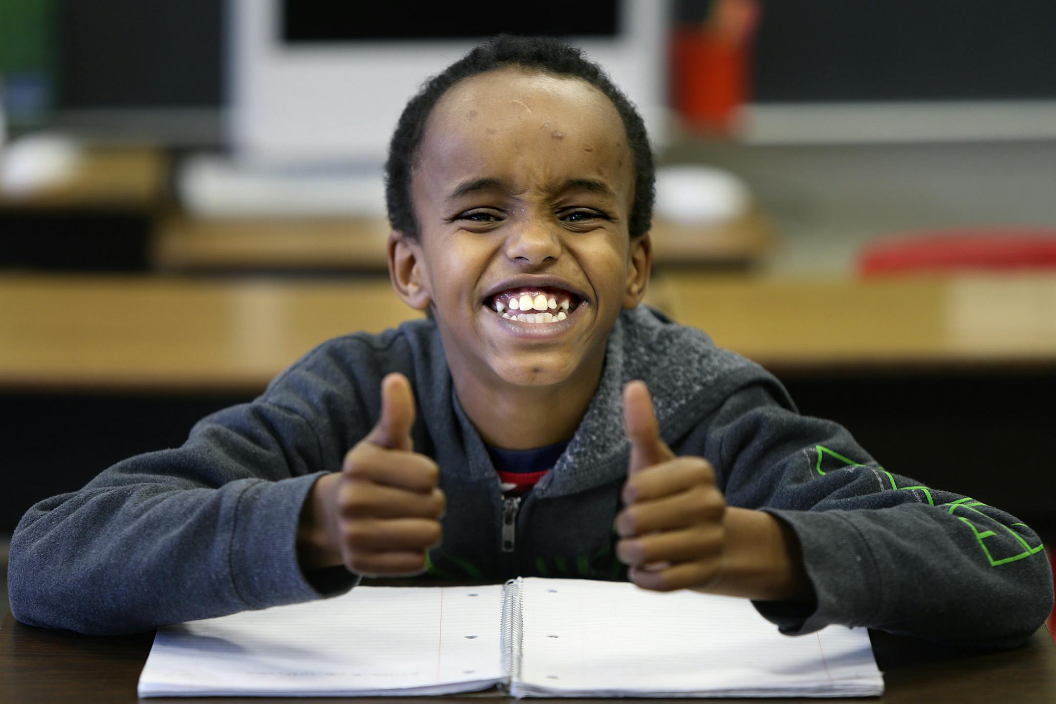Sullivan student Zekeria Yusuf, 11, gave a thumbs-up after he answered a question correctly during Stephany Jallo's class, Wednesday, January 22, 2014 in Minneapolis, MN. (ELIZABETH FLORES/STAR TRIBUNE) ELIZABETH FLORES &#x2022; eflores@startribune.com
