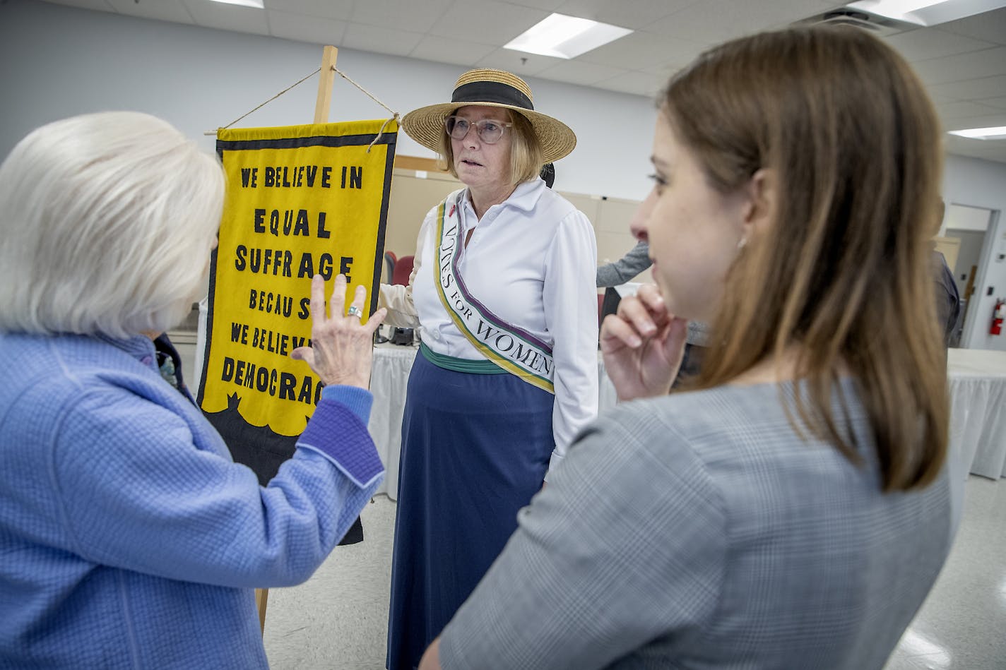 Deborah Jindra, cq, the former president of the league of women voters was on hand to answer questions during a ribbon cutting ceremony to open the new Elections & Voter Services, Friday, October 4, 2019 in Minneapolis, MN. The event included a tour of the new facility, including historical voting equipment, speeches, and history about Minnesota and Minneapolis&#x2019; suffrage story with the commemorative League of Women Voters exhibit in honor of the 100th Anniversary of the 19th Amendment. ]